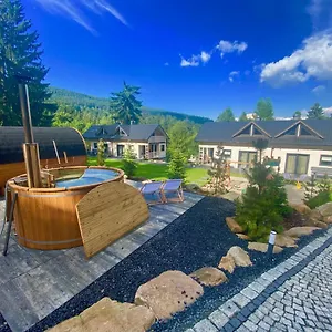 https://white-holiday-domki-i-apartamenty.szklarskaporebahotels.net